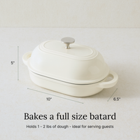 Dimensions of the oval bread oven: 10 in by 6.5 in interior, 5 in tall, bakes a full-size batard up to 2 lb of dough