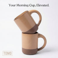 Two Wheat mugs stacked, showing the unglazed clay foot