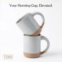 Two Dove Grey mugs stacked, showing the unglazed clay foot