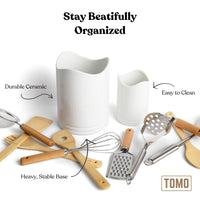 Utensil crocks with kitchen tools laid out: durable ceramic, easy to clean, heavy stable base